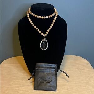 Elegant Beaded Necklace with clear teardrop Pendant